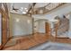 Grand foyer with staircase, hardwood floors, and ample natural light at 2880 Lake Meadow Dr, Monument, CO 80132