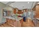 Kitchen with stainless steel appliances, granite countertops and island at 2880 Lake Meadow Dr, Monument, CO 80132