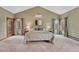 Vaulted main bedroom featuring large windows, and neutral colors at 2880 Lake Meadow Dr, Monument, CO 80132