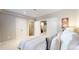 Basement bedroom with double doors and en-suite bathroom at 6931 Buckskin Dr, Littleton, CO 80125