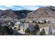 Beautiful hillside community with stunning mountain views and well-maintained landscaping at 6931 Buckskin Dr, Littleton, CO 80125