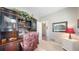 Home office features built-in shelving and a comfortable leather desk chair at 6931 Buckskin Dr, Littleton, CO 80125