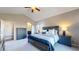 Main bedroom with high ceilings and ensuite bathroom access at 6931 Buckskin Dr, Littleton, CO 80125
