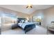 Spacious main bedroom with high ceilings and private balcony access at 6931 Buckskin Dr, Littleton, CO 80125