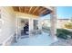 Ground level patio with seating area and view of community at 6931 Buckskin Dr, Littleton, CO 80125