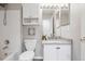 Bathroom featuring a vanity sink, updated hardware, and shower and tub combo at 9579 Bighorn Way, Littleton, CO 80125