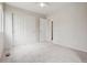 Bedroom with carpet flooring, ceiling fan, and closet for storage at 9579 Bighorn Way, Littleton, CO 80125
