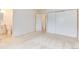 Bedroom featuring carpet floors, double closets, and access to an ensuite bathroom at 3150 S Pitkin St, Aurora, CO 80013
