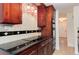Updated kitchen showcasing modern appliances and dark wood cabinetry at 3150 S Pitkin St, Aurora, CO 80013