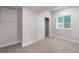 Cozy bedroom with carpet, sliding closet doors, and a bright window, creating a serene space at 2171 Peralta Loop, Castle Rock, CO 80104
