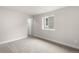 Bright, carpeted bedroom with a window offering a pleasant view and natural light at 2171 Peralta Loop, Castle Rock, CO 80104