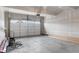 Spacious unfinished garage with room for two cars and some equipment at 2171 Peralta Loop, Castle Rock, CO 80104