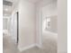 Bright hallway with multiple doors leading to various rooms creating functional spaces at 2171 Peralta Loop, Castle Rock, CO 80104