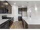 Well-equipped kitchen with a large island, stainless steel appliances, and ample cabinet space at 2171 Peralta Loop, Castle Rock, CO 80104