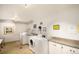 Clean and well-maintained laundry room with modern washer and dryer units at 1085 N Lafayette St # 602, Denver, CO 80218