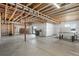 Unfinished basement with plumbing and electrical rough-in for future customization at 239 Rogers Ct, Castle Rock, CO 80104