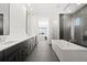 Luxurious bathroom with double vanity and soaking tub at 239 Rogers Ct, Castle Rock, CO 80104