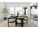 Bright dining area with a table and chairs, overlooking a scenic view at 239 Rogers Ct, Castle Rock, CO 80104