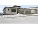 Modern two-story home with attached two-car garage and snow-covered front yard at 239 Rogers Ct, Castle Rock, CO 80104