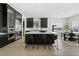 Spacious kitchen with large island, stainless steel appliances, and lots of natural light at 239 Rogers Ct, Castle Rock, CO 80104