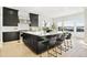 Modern kitchen with large island, stainless steel appliances, and ample cabinet space at 239 Rogers Ct, Castle Rock, CO 80104