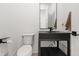 Modern powder room with concrete sink and sleek fixtures at 239 Rogers Ct, Castle Rock, CO 80104