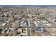 Overhead view of a residential neighborhood with mature trees and well-maintained homes at 5242 Columbine Ln, Denver, CO 80221