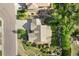 Bird's-eye view of a home, revealing its well-maintained roof, driveway, landscaping, and attractive curb appeal at 3380 Quail Ct, Wheat Ridge, CO 80033