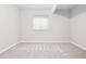 Carpeted bedroom with natural light, window with blinds, and neutral wall color at 3380 Quail Ct, Wheat Ridge, CO 80033