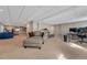 Spacious finished basement featuring a lounge area and office space at 5338 Potentilla St, Brighton, CO 80601