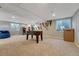 Spacious finished basement with carpet and egress windows at 5338 Potentilla St, Brighton, CO 80601