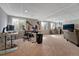 Finished basement featuring carpet, windows and an office area at 5338 Potentilla St, Brighton, CO 80601