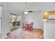 Cozy dining area with a ceiling fan and sliding glass doors to the deck at 12483 E Wesley Ave, Aurora, CO 80014