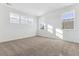 Well-lit bedroom with neutral walls and carpet flooring at 8773 Yellowcress St, Littleton, CO 80125