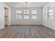 Bright dining room with hardwood floors and chandelier at 8773 Yellowcress St, Littleton, CO 80125