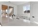 Modern kitchen island with white quartz countertops at 8773 Yellowcress St, Littleton, CO 80125