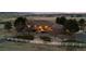 Lovely acreage with circular driveway and a white perimeter fence ensuring privacy and charm at 5540 Horseshoe Trl, Sedalia, CO 80135
