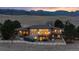 Expansive home featuring large picture windows with mountain views at 5540 Horseshoe Trl, Sedalia, CO 80135
