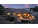 Charming home with outdoor entertaining area and stone patio at 5540 Horseshoe Trl, Sedalia, CO 80135