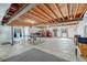 Unfinished basement with ping pong table and storage at 42396 Glen Abbey Dr, Elizabeth, CO 80107