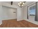 Bright dining room with hardwood floors, a beam ceiling, and large window with nice view at 42396 Glen Abbey Dr, Elizabeth, CO 80107