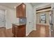 Spacious kitchen with wood floors, granite countertops, and modern lighting at 42396 Glen Abbey Dr, Elizabeth, CO 80107