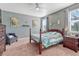 Relaxing main bedroom with carpeted floors and a ceiling fan at 42396 Glen Abbey Dr, Elizabeth, CO 80107