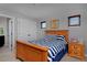 Cozy bedroom features wood furnishings, artwork, and great natural light at 1315 W 141St Cir, Westminster, CO 80023