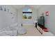 Charming bedroom features a large window, vaulted ceilings, and a playful ambiance at 1315 W 141St Cir, Westminster, CO 80023