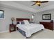 Bright bedroom features neutral tones, stylish decor, and bedside tables at 1315 W 141St Cir, Westminster, CO 80023