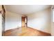 Bright bedroom with hardwood floors and neutral walls, ready for personalization at 2300 Joliet St, Aurora, CO 80010