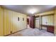 Bedroom features vintage wallpaper, closet, and natural light at 2300 Joliet St, Aurora, CO 80010