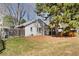 Expansive backyard featuring a well-maintained lawn and a wooden fence at 309 S Hudson St, Denver, CO 80246