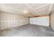 Spacious garage interior featuring concrete floors and white walls, ready for customization at 309 S Hudson St, Denver, CO 80246